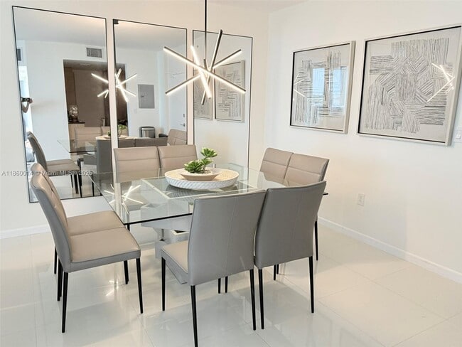 Building Photo - 10275 Collins Ave