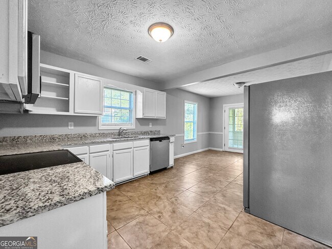 Foto del edificio - 5844 Meadow Ln