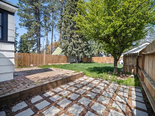 Building Photo - Spacious 4-Bedroom Home w/large Outdoor Sp...