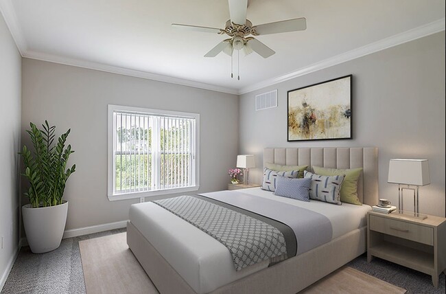 Primary bedroom with natural light - The Reserve at Brookhaven