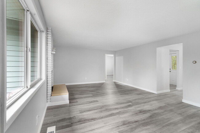 Living room and doorways to kitchen and bedrooms - 1225 Johnson St