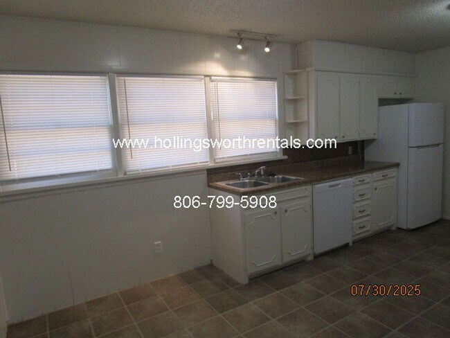 Foto del edificio - 4 bedroom, 2 bath, 2 car garage with shop ...
