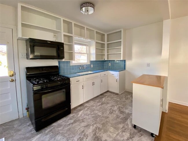 Building Photo - 7111 Grover Ave