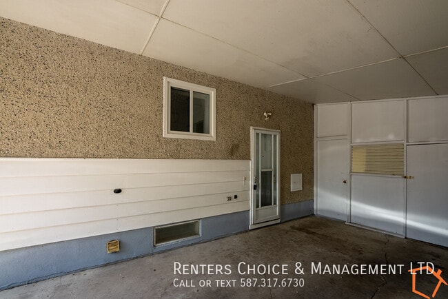 Building Photo - Nicely Updated Basement Suite with Private Laundry + Shed Storage