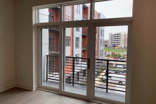 Balcony and sliding doors with open views - 575 S Goddard Blvd