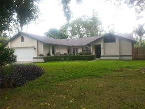 Building Photo - 9149 Palm Tree Dr
