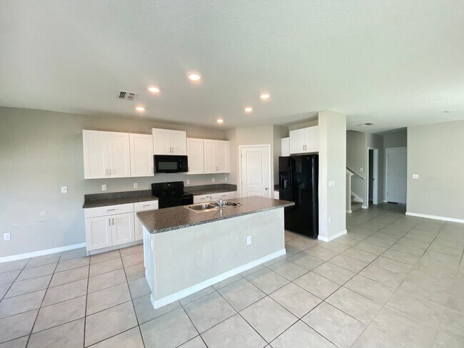 Building Photo - 7206 Samuel Ivy Dr Tampa, FL 33619