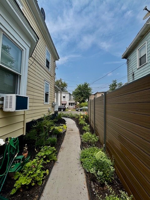 Garden Path to Apt. - 1016 W 3rd St