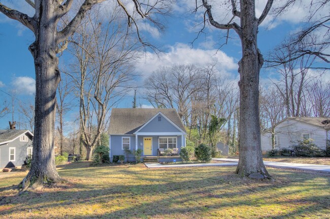 Building Photo - Step into this charming bungalow home, whe...