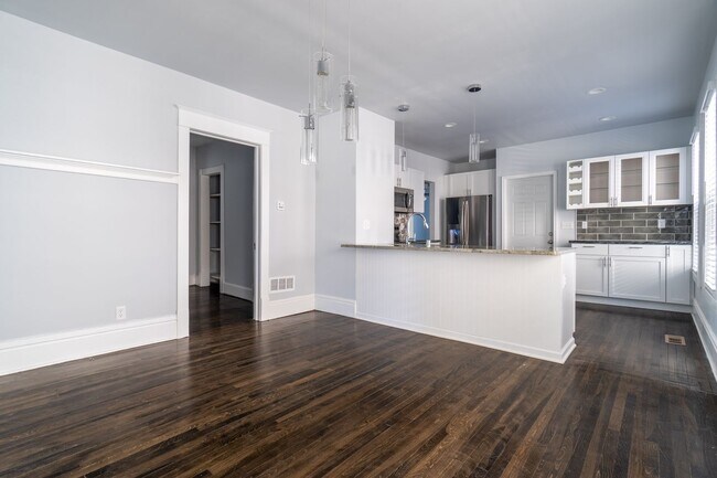 Building Photo - Don't Miss This Lovely Lower Unit in the H...