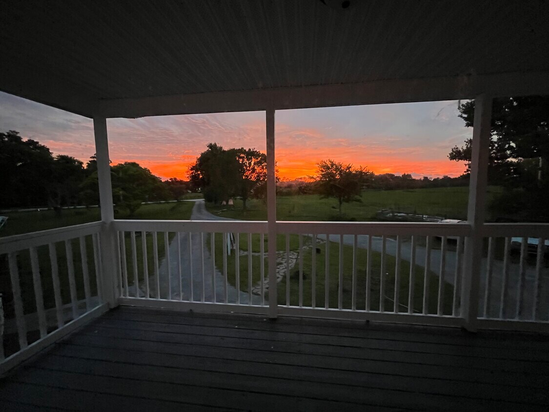 Front porch view at sunset - 501 Leeway Trl