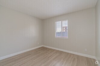 C1 - 3BR, 1BA - 950SF - Third Bedroom - Mariposa Flats