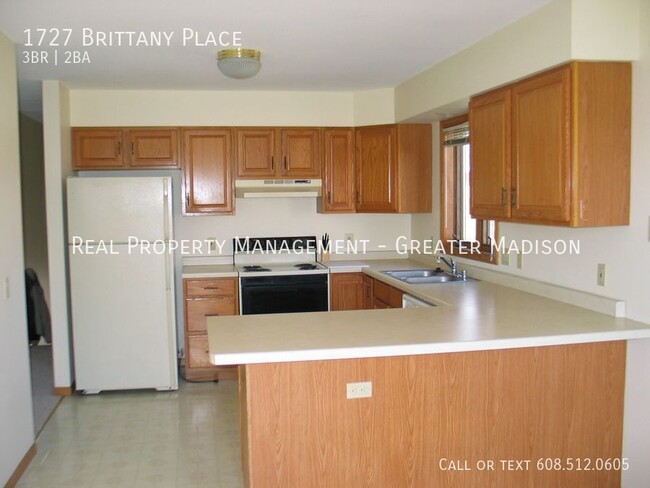 Building Photo - Large well kept duplex rental home on Madi...