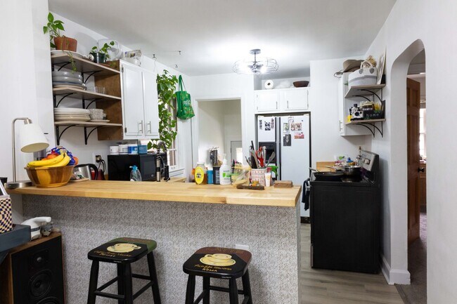 Building Photo - Charming home with a finished basement and...