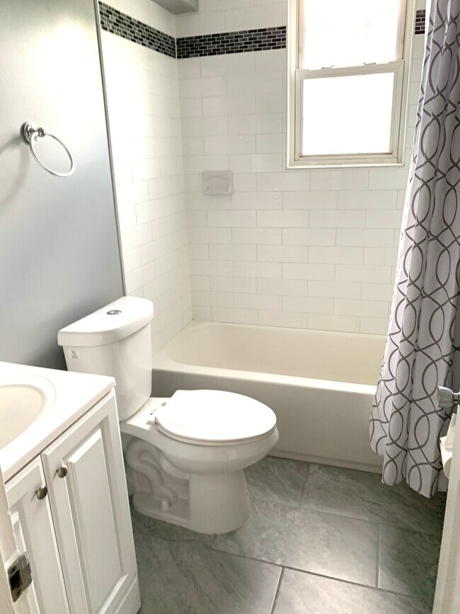 Updated bathroom - 4491 MacArthur Blvd NW