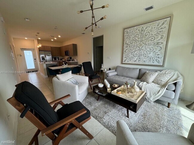 Building Photo - 3 br, 2 bath House - 8363 NW 41st St # A-308