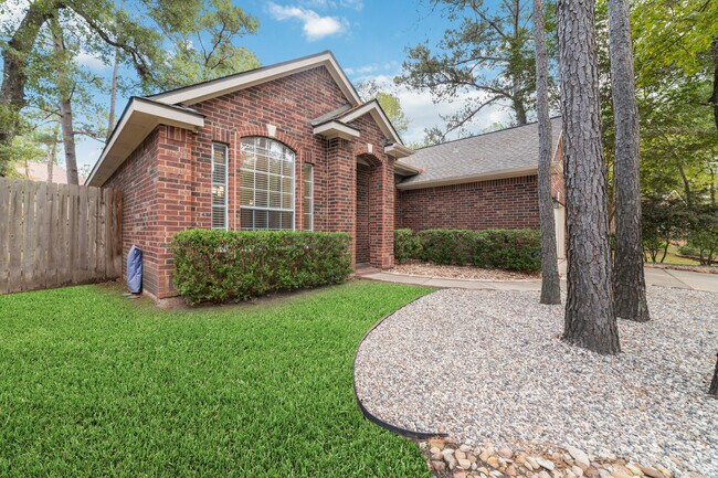 Front view with nice landscaping. - 6 Leaf Spring Pl