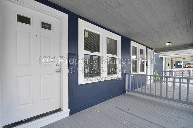 Building Photo - 1311 E 24th Ave