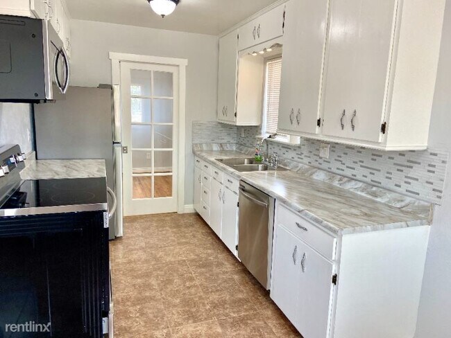Building Photo - 4 br, 2 bath House - 1214 Holmes Dr