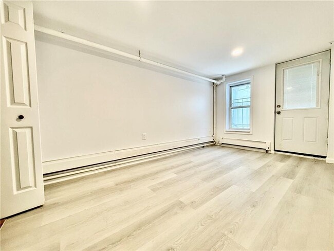 Building Photo - 8689 15th Ave