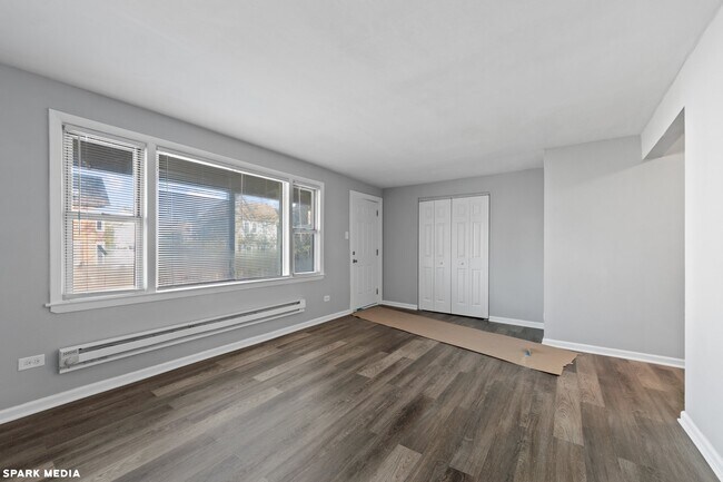 Building Photo - 7617 S Colfax Ave