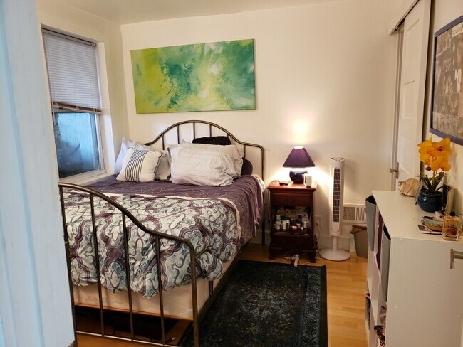 bedroom sliding door to walk in closet on right - 1626 Massachusetts Ave SE