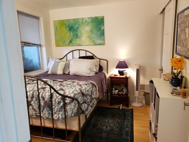 bedroom sliding door to walk in closet on right - 1626 Massachusetts Ave SE