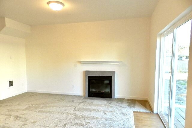 Building Photo - Updated University Place Townhome: 3 Beds, 2 Baths, Garage + Driveway Parking