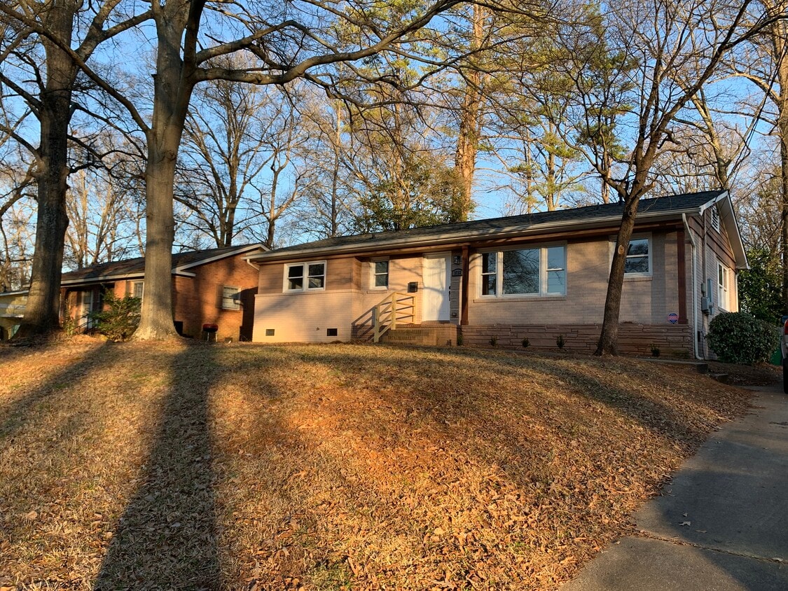 Large front yard set back from the street - 3733 Blandwood Dr