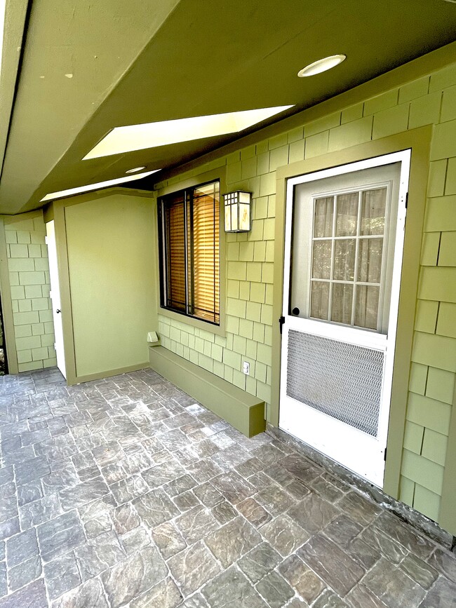 Front Patio with overhang with skylites - 6116 Colby St