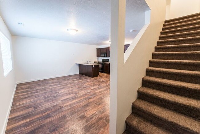 Building Photo - WATERS EDGE! Gorgeous Townhome