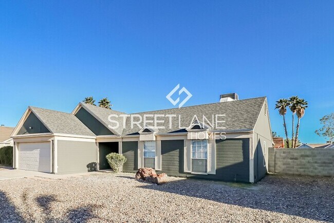 Building Photo - REDUCED PRICE! Charming 4 Bedroom in Peoria!