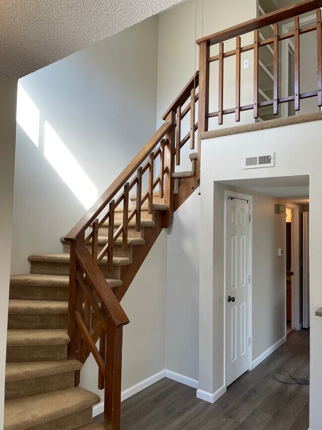 Stairs leading to master bathroom and bedroom - 6570 E Mississippi Ave