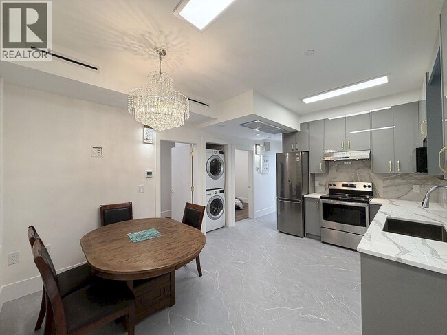 Building Photo - 10XX E 62nd Ave