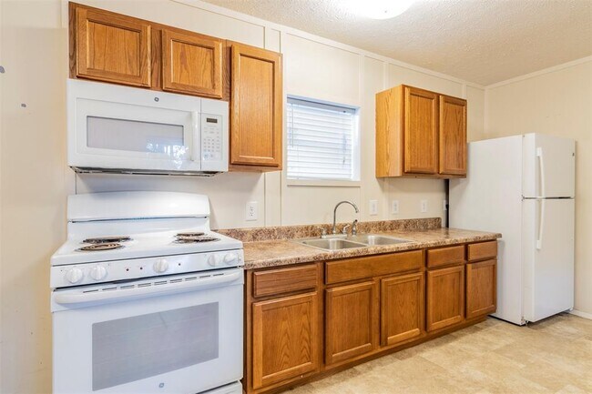 Foto del edificio - 9203 Greens Rd