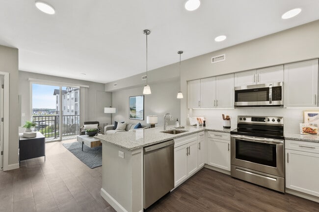 Building Photo - Avenida at Centerra 55+ Active Adult Apartment Homes