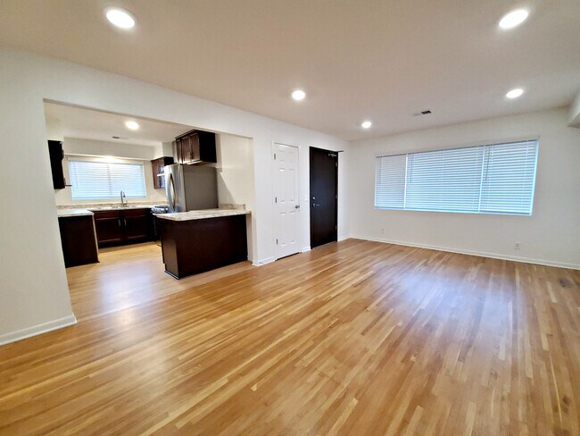 Breakfast bar and hardwood floors throughout - 5900 3rd St NE