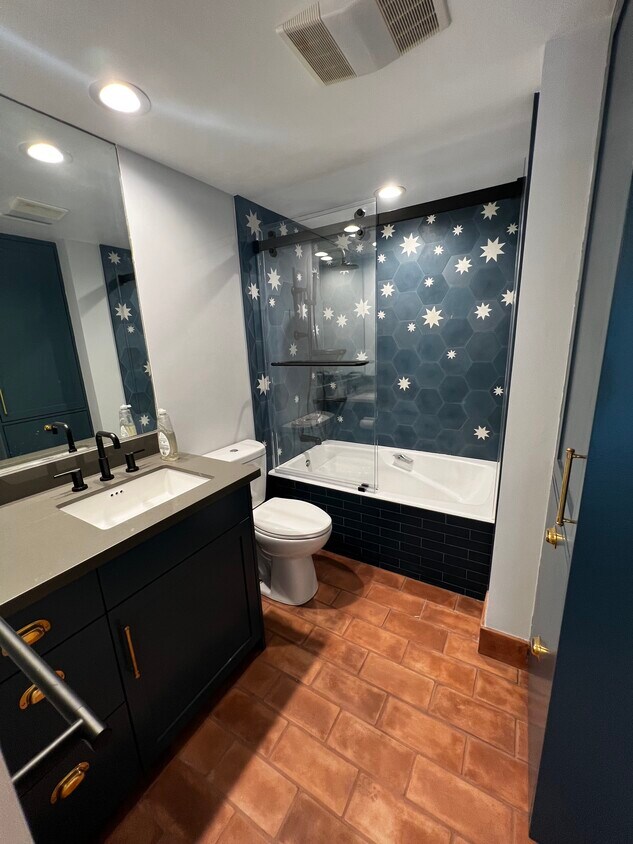 Full bath + shower and plenty of storage space - 800 W 1st St