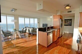Building Photo - 6365 Collins Ave