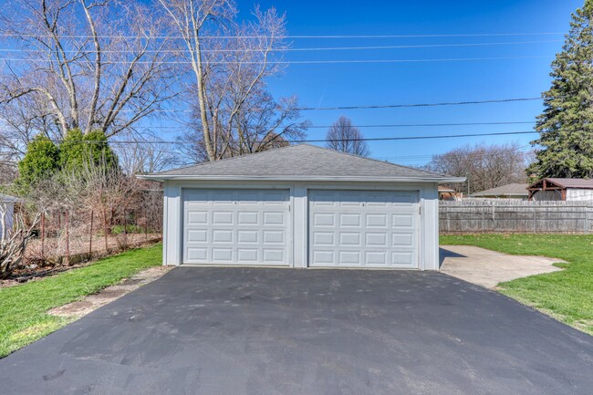 garage space with long driveway - 1317 N 116th St