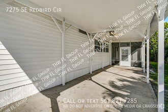 Building Photo - 7275 SE Redbird Cir