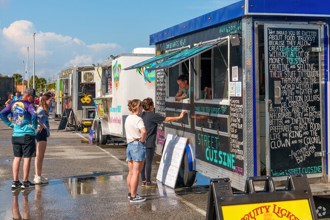 Merritt Island residents explore the menu at the monthly Food Truck Festival.