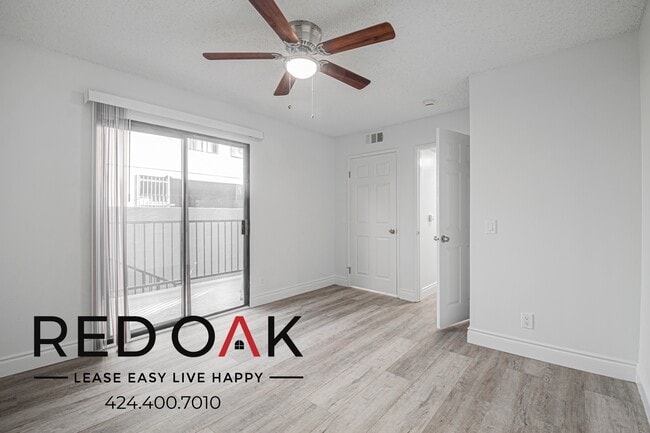 Building Photo - 10133 Pinewood Ave