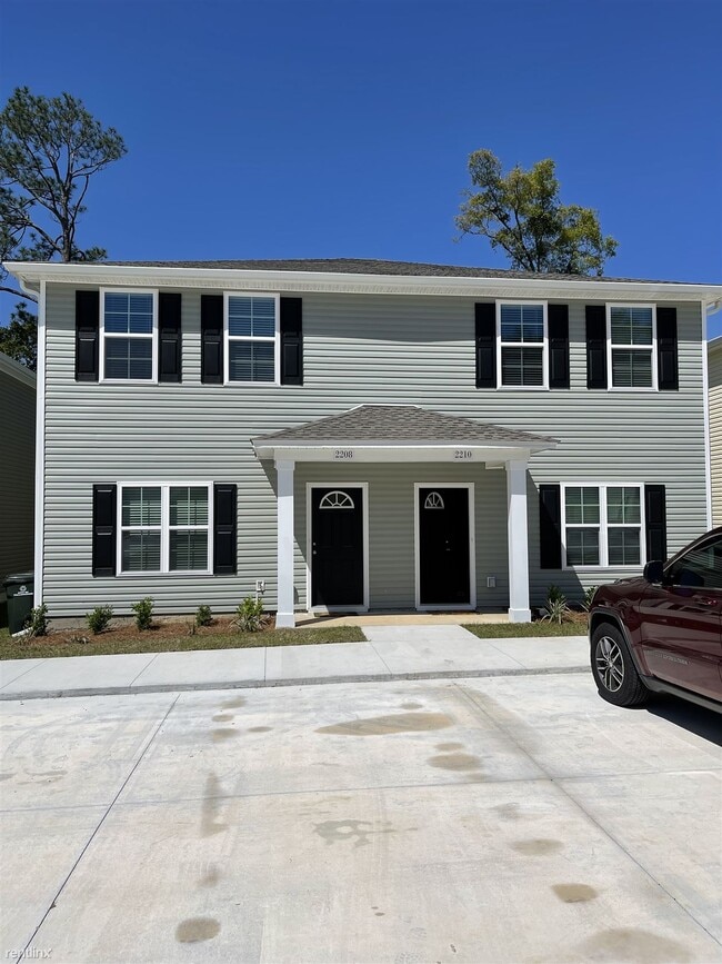Building Photo - 3 br, 3 bath Townhome - 2208 Cedarbrook Court
