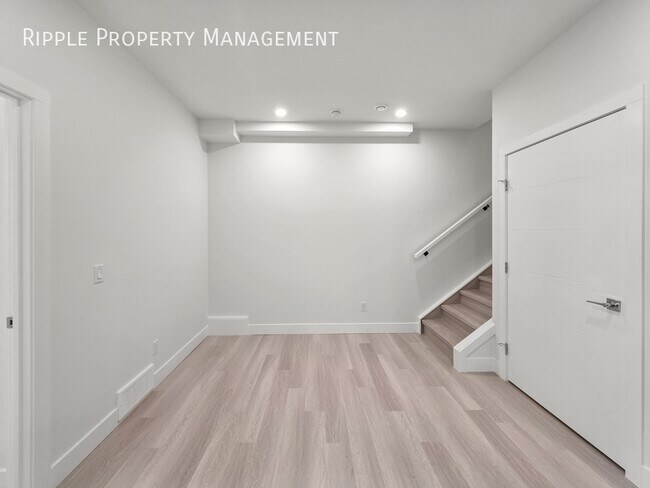 Photo du bâtiment - BRAND NEW 2 BEDS, 1 BATH BASEMENT SUITE | CENTRAL AC | PRIME BOWNESS LOCATION