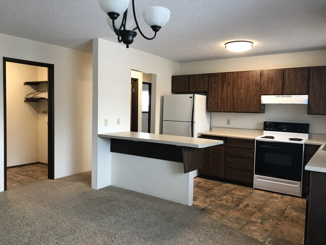 Kitchen and Laundry Room View - 105 Evergreen Dr