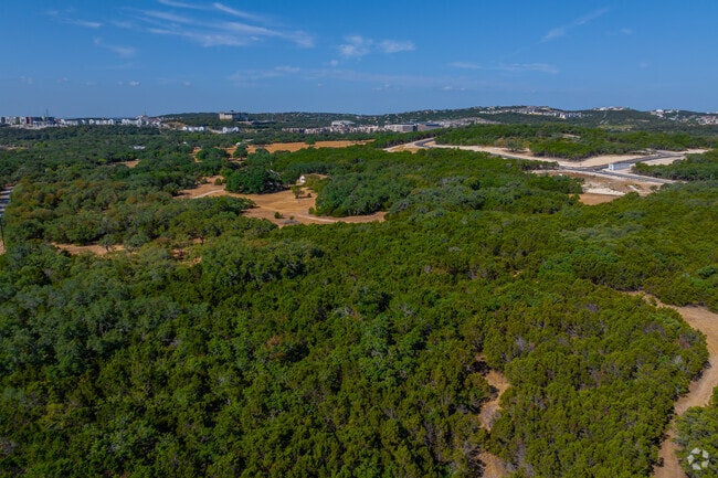 The area around The Rim is the beginning of hill country with rolling green hills.