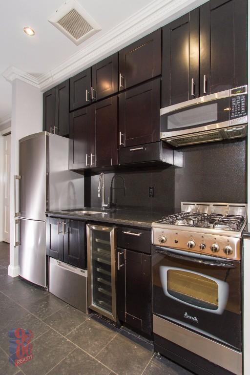Photo - 213 E 26th St Apartment