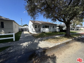 Building Photo - 6003 Bellflower Blvd