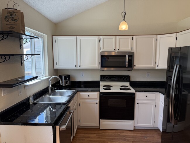 Building Photo - 9748 W 70th Pl
